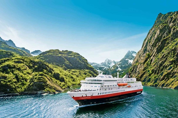 Explore narrow fjords and bays like Trollfjord