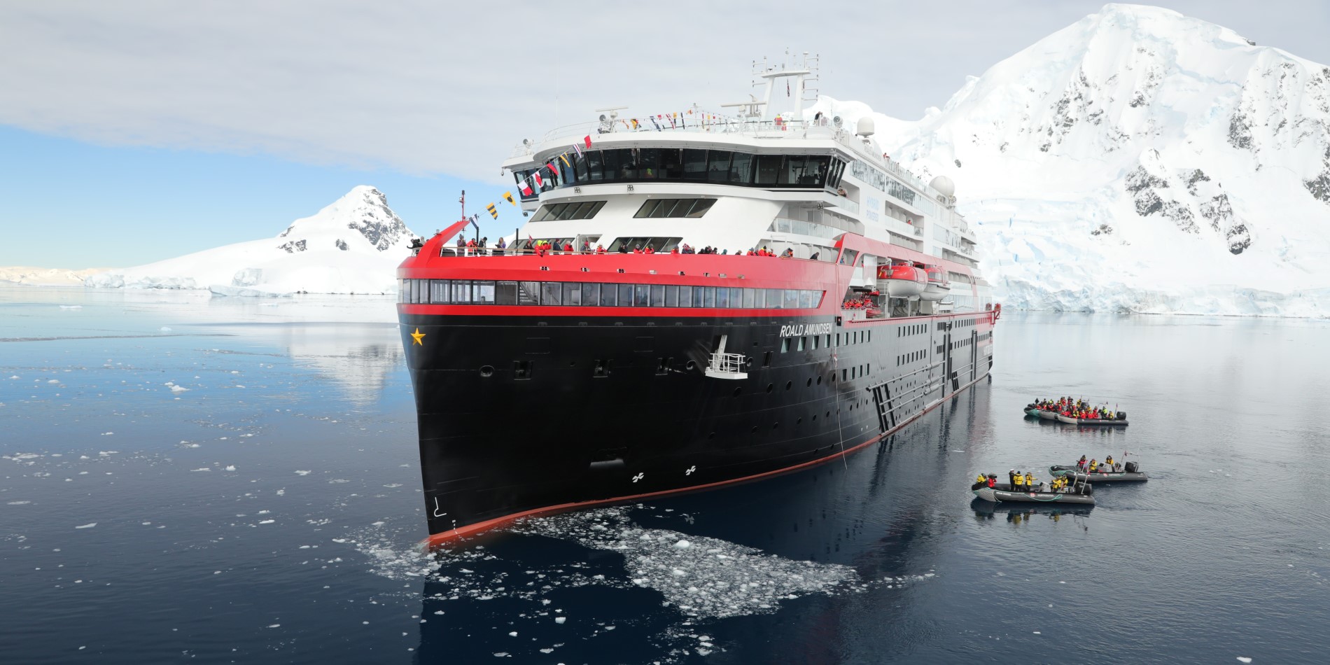 MS Roald Amundsen docked in Antarctica for the boat naming ceremony. 