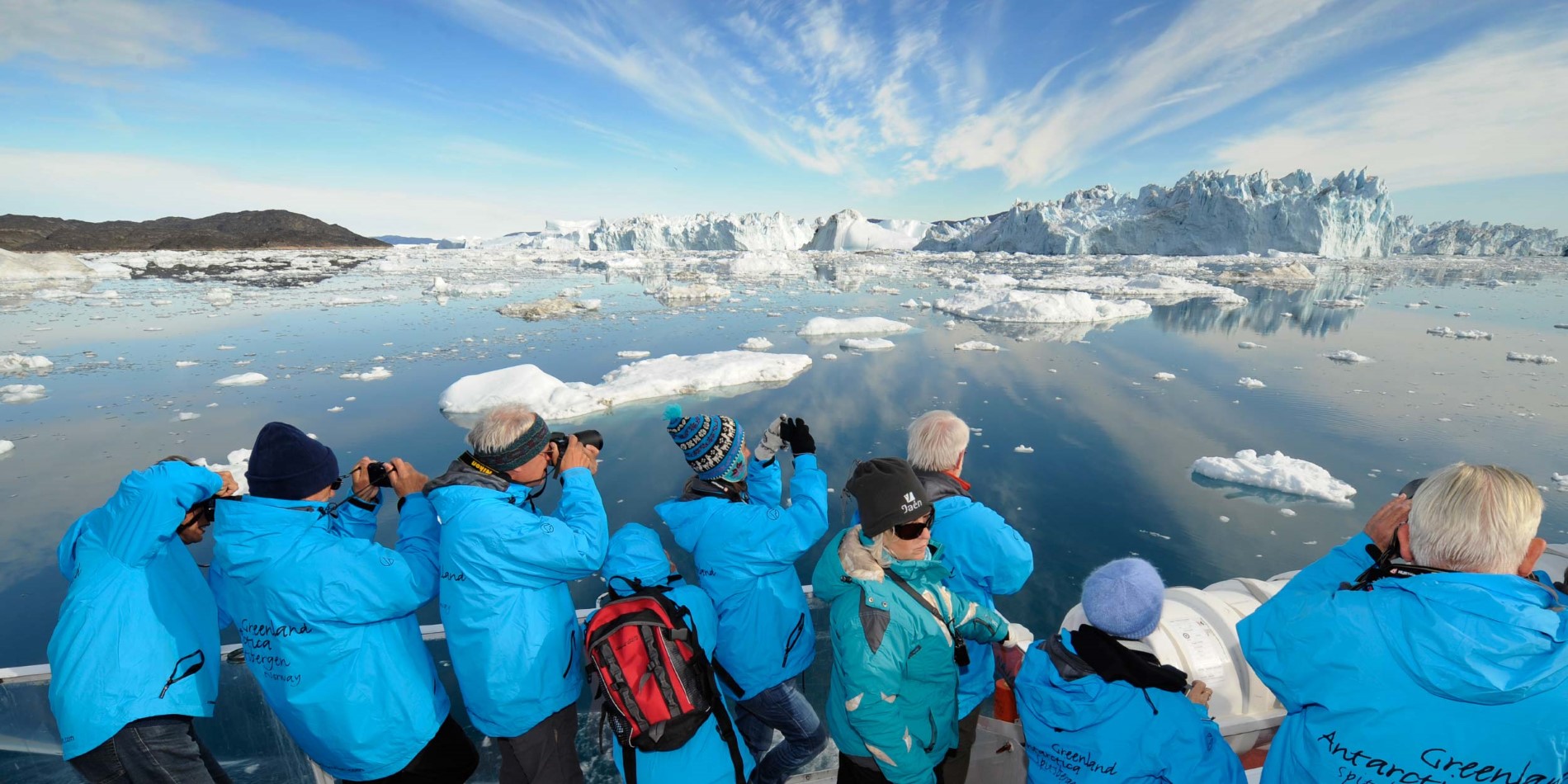 Icebergs icefjord tour boat Greenland