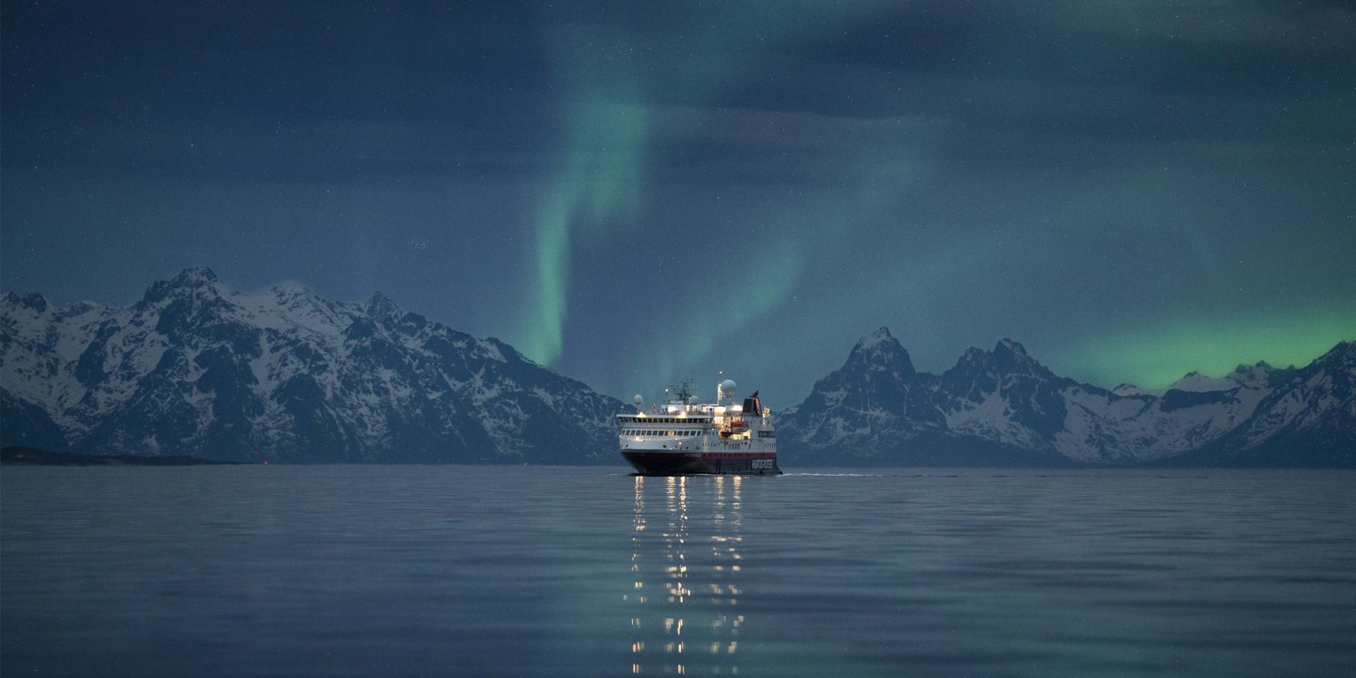 MS Spitsbergen under the Northern Lights in Norway