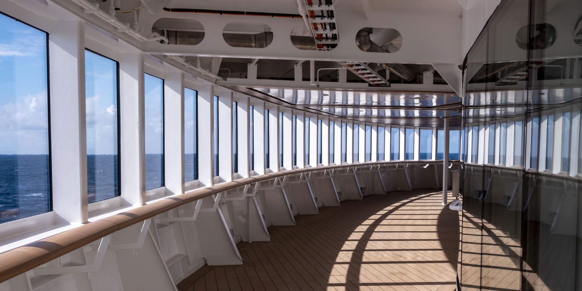 Deck that goes around the ship, windows on the left side.