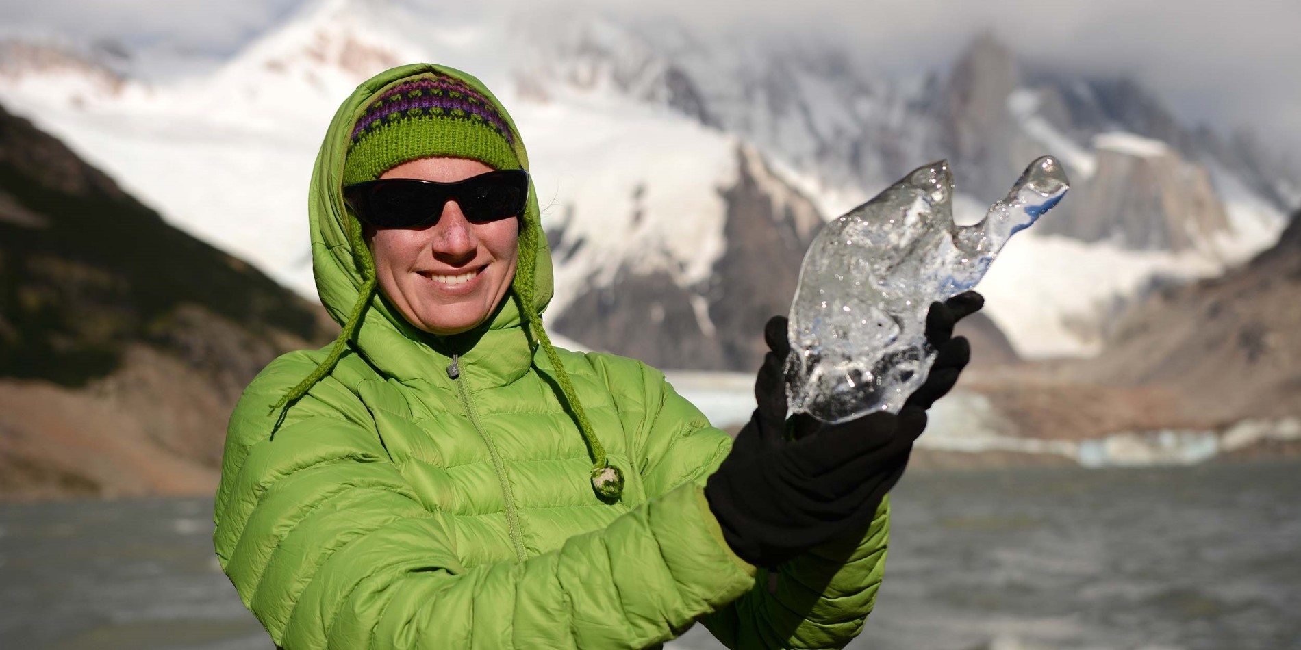 Woman with block of ice in her hands